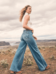 Lean into the little details with our Women’s Patch Pocket Wide Leg Jean. Starting with a high-rise waist, this jean descends into an ultra-wide leg for a bold, A-line silhouette with no shortage of volume. It also comes with a button-fly closure, pockets from front to back, and the signature ‘W’ stitching to complete your look with a little Wrangler® authenticity.